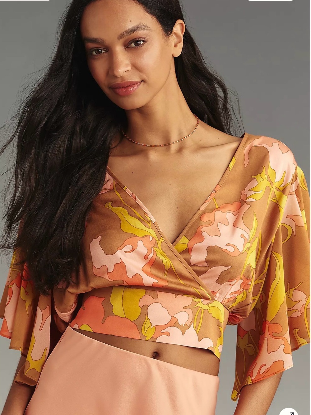Anthropologie/Tiny Women's Floral Faux Wrap Crop Top in Peach Multi